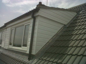 800px-concrete_tile_re-roof_with_upvc_dormer-300x225